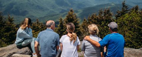 group of people on mountain top