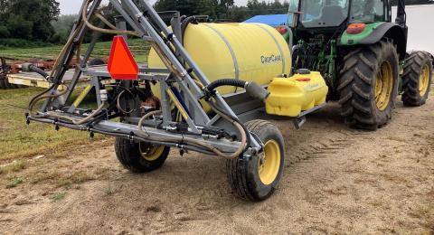 Boom Sprayer on back of a tractor