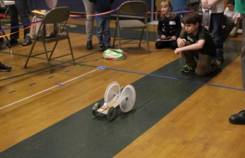 Boy with Mousetrap Car