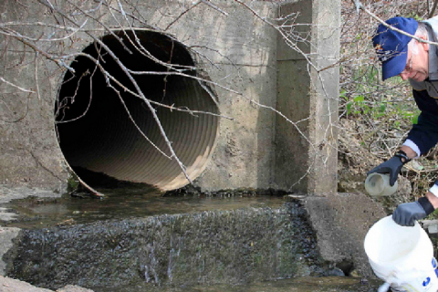 man working near culvert