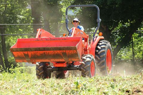A women on a tractor