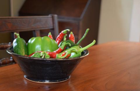 Bowl of peppers on kitchen table